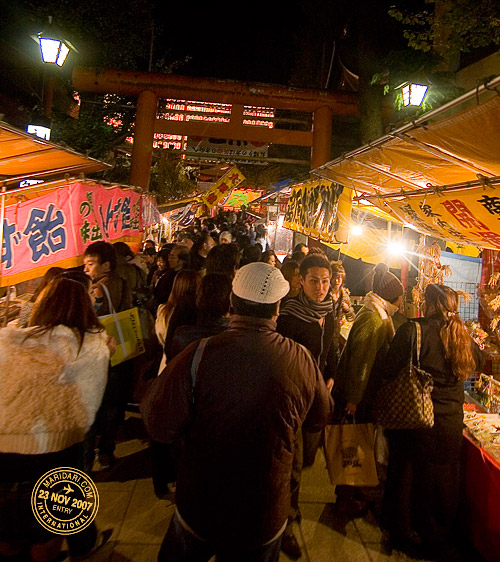 A line of street hawkers near Hanazono shrine in Shinjuku, Tokyo, Japan