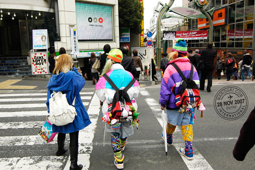 Harajuku teenagers crossing the road leading to Takeshita Dori