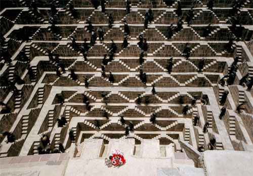 The Fall's character Charles Darwin at the Chand Baori, one of the deepest and largest step wells in India located in a village near Jaipur, Rajasthan