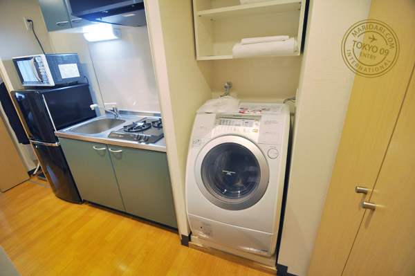 B-SITE Akihabara Tokyo Apartment review and images - photo of washing machine and dryer, stove and refrigerator