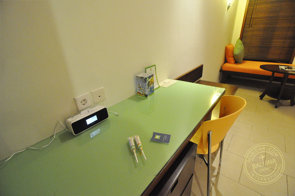 All Seasons Legian Bali review - bed room view, work desk with ipod dock